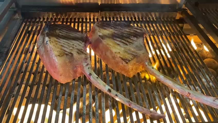 Aberdeen Angus steaks sizzling over the grill at The Copse.
